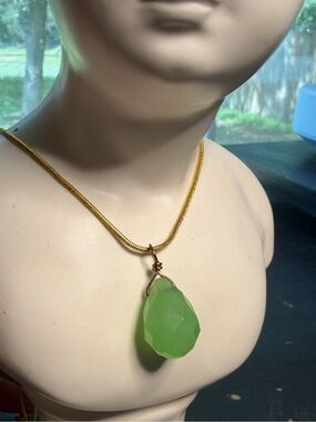 Jade briolite on gold. 16”.